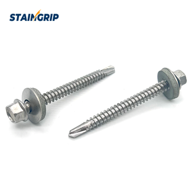 Bi-metal self-drilling screws with hex heads, washers and drill tips on a white background